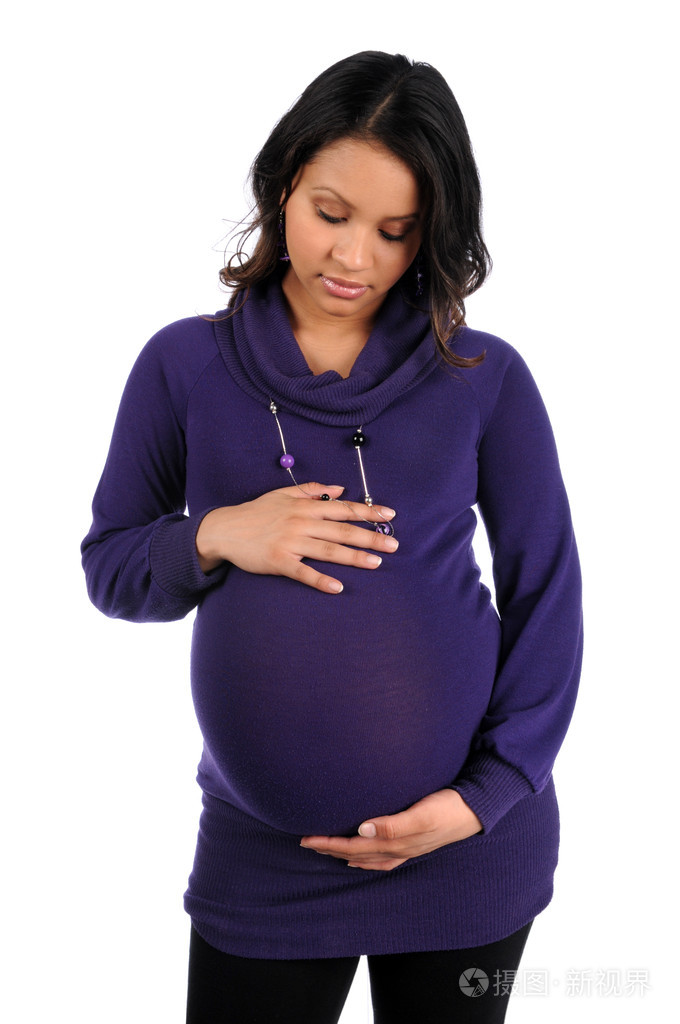 怀孕的女人控股肚皮