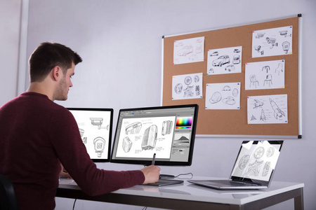 在办公室用图形平板电脑设计绘图箱侧面图照片