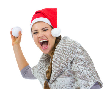 快活的女人，在圣诞老人帽子扔雪球