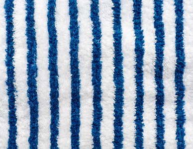 蓝色和白色的条纹的毛巾照片
