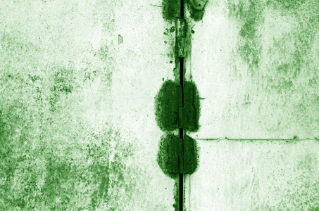 蹩脚生锈的金属表面在绿色色调。抽象背景和纹理