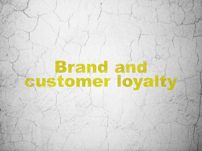 经营理念 黄色品牌与顾客忠诚在质感混凝土墙体背景下图片