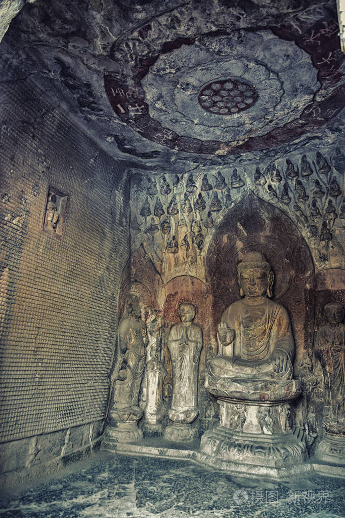 洛阳, 克雷斯波, 中国-12月 252017: 雕刻佛像图片在龙门洞穴, 龙门