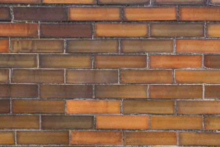 砖背景。砖墙是用水泥砂浆上的矩形砌块建造的。