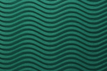 在详细的纸张背景上浮雕波浪.波纹波浪纸板背景照片