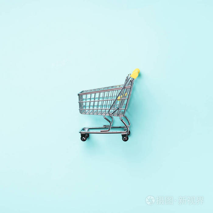 购物车在蓝色背景.简约风格.方形作物.创意设计.