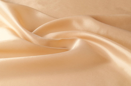 真丝面料壁纸纹理背景图案在棕褐色粉彩黄色米色色调: 可爱的天然丝绸