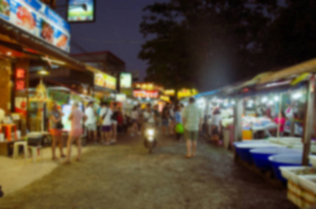 模糊节日餐饮夜市的背景使用。可用于显示