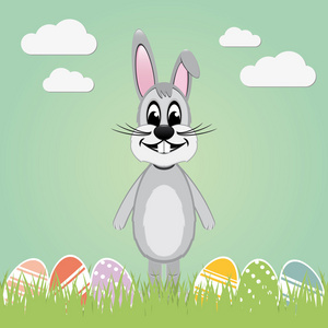 灰色复活节兔子草坪和丰富多彩的蛋