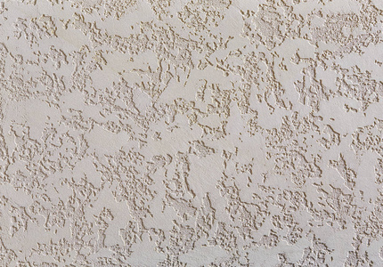 老粗糙白色石膏墙体的近表面细节, 宏观