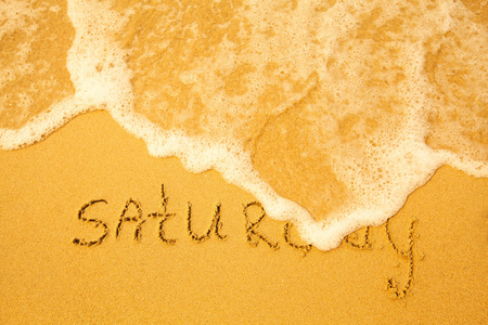 星期六写在沙滩上的沙质地软波的s