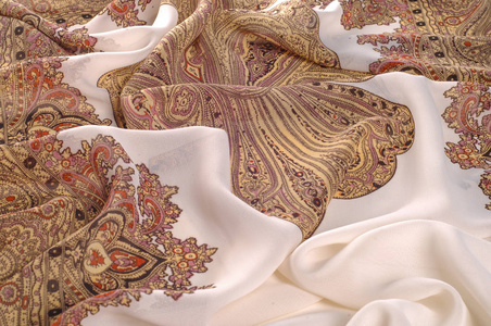 纹理, 图案。白色真丝织物, 棕色图案。印度设计的女性围巾。任何其他名称的图画可以闻起来像甜, 但不会看起来像这些图案的丝绸华丽