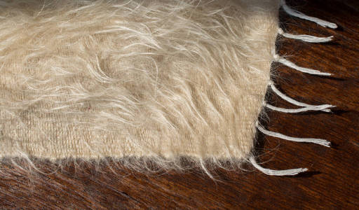软毛羊毛织物的织构背景图片