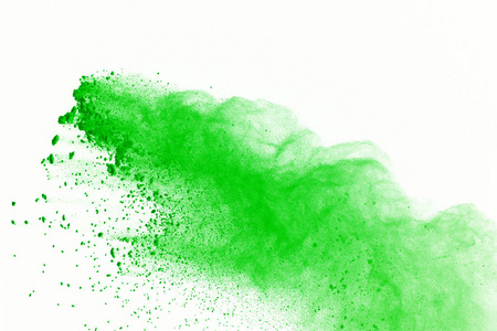 绿色粉末 splatted 在白色背景下分离的文摘。彩色粉末爆炸