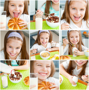 女孩早餐可爱的小女孩,吃她的早餐照片