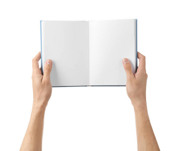 男性手拿着空白页的书在白色背景上照片
