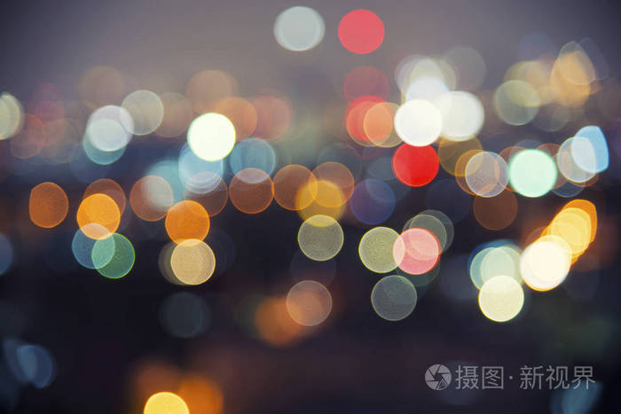 圆形散景运动的背景图像模糊城市街道灯光背景, 夜间汽车交通信号灯