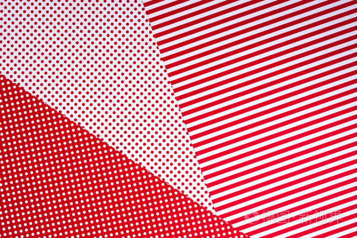 红色和白色的顶部视图以圆点图案为背景的抽象组合
