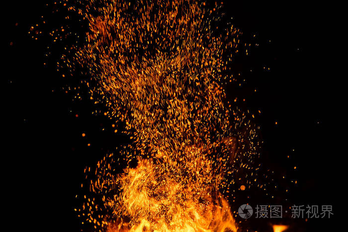 照片 火火花粒子与火焰隔离在黑色背景.非常高的分辨率.jpg