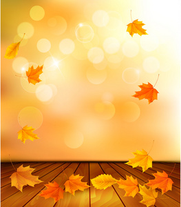 与木地板和秋天的树叶背景。矢量