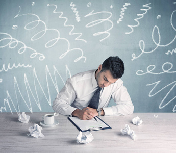 聚焦线条疲倦的上班族与画出凌乱的线条照片