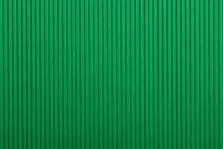 纸板波纹图案背景垂直于绿色