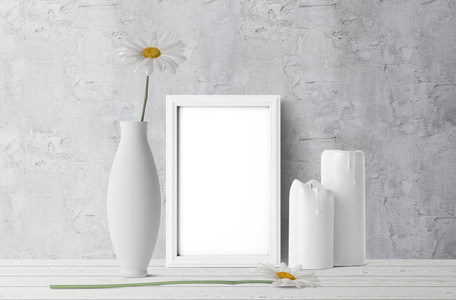 空的相片框架用白色蜡烛和 chamomiles 与花瓶