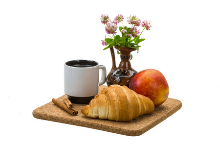 早餐辨咖啡和牛角面包