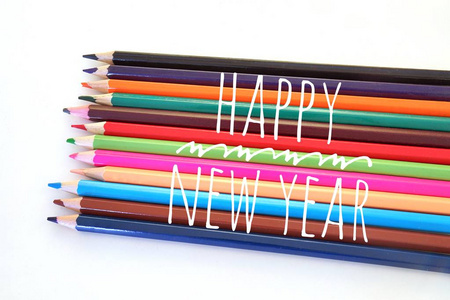 彩色铅笔在新年快乐的概念图片