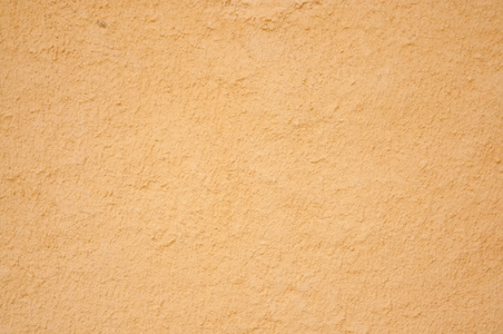 背景或纹理的太阳烤的泥巴墙照片