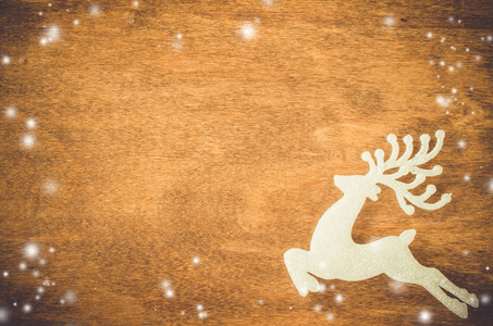 圣诞节背景与装饰鹿。圣诞贺卡。复制空间。雪效果, 色调图像