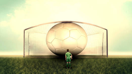 足球运动员在球场上看着一个超大的球在球门
