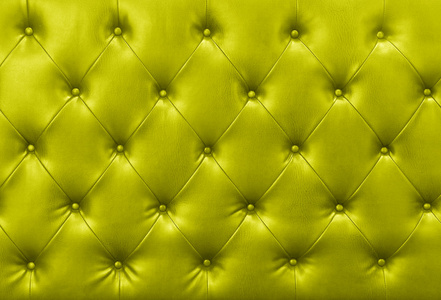 黄色沙发皮革背景