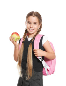 女学生与健康的食物和背包在白色背景