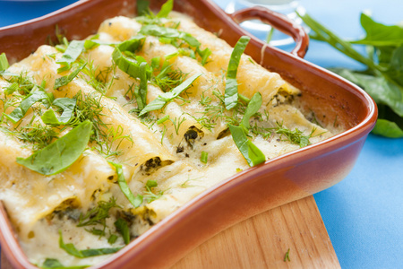 cannelloni with ricotta baked with bchamel sauce