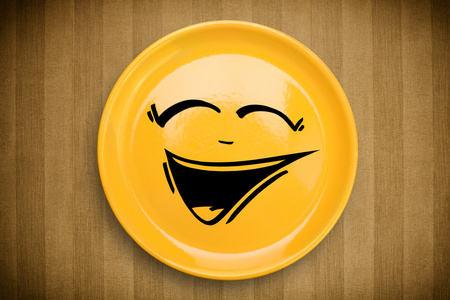 快乐卡通笑脸多彩的菜盘子图片