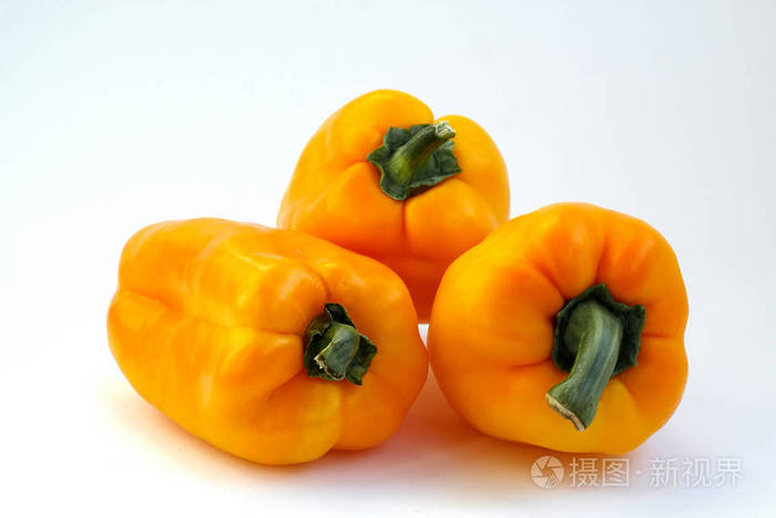 新鲜和甜胡椒铃在孤立的白色背景蔬菜农副产品橙色颜色