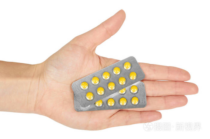 药物药片在水泡手里的药片在白色背景被隔绝药房和药物