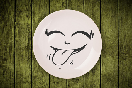 快乐卡通笑脸多彩的菜盘子图片