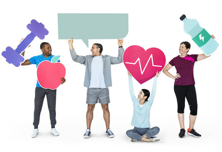 健身群体持有健康和健身图标的不同人群群体照片