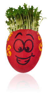复活节彩蛋画在一个滑稽的笑脸人的脸和红色的彩色