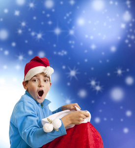 圣诞节的圣诞老人礼物袋惊喜表达的孩子