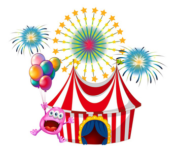 烟花彩色卡通狂欢节上的快乐怪物照片