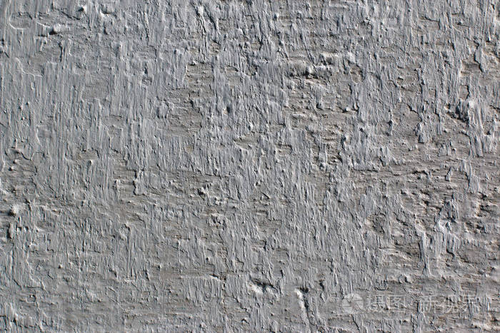 具有粗糙裂纹纹理的灰色混凝土墙体