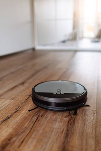 机器人真空吸尘器在层压木地板智能清洗技术。选择性聚焦