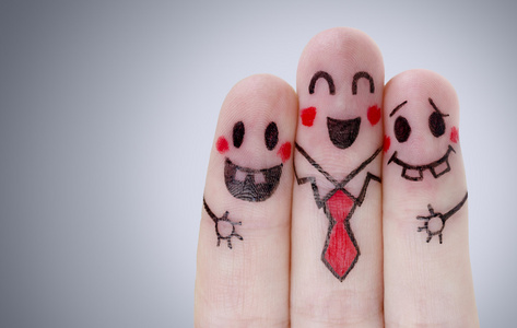 手指伙伴关系手指与快乐的笑脸照片