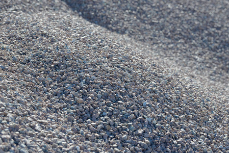 道路砾石.砾石质地.碎石的背景.成堆的石灰岩岩石.
