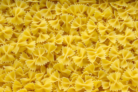 farfalle 通心粉背景与面食。顶部的视图, 纹理的特写