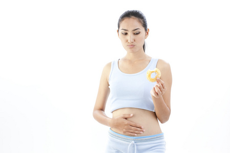 饮食控股甜甜圈的女人