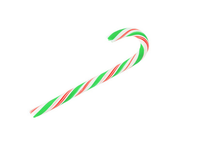 圣诞节糖果藤与绿色弓查出的白色背景
